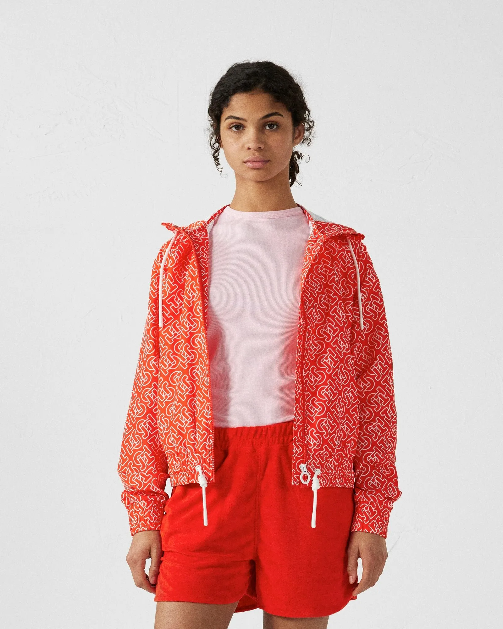 Blouson coupe-vent léger à capuche alize monogram Rouge