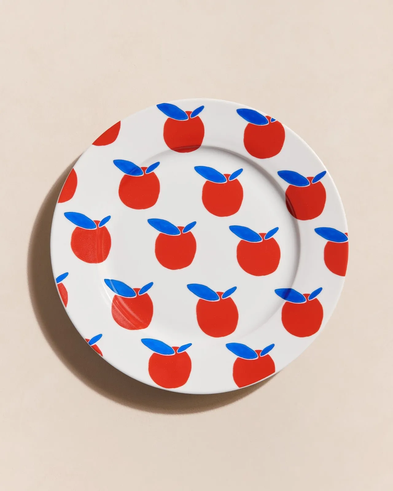 L'assiette pommes all-over en porcelaine Blanc